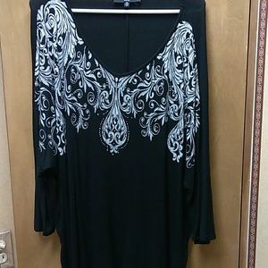 Black shirt, batlike sleeves